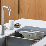 silicone dish rack shown on a sink with eco friendly dish cloths